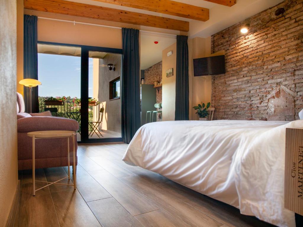 Postel nebo postele na pokoji v ubytování Priorat Aparthotel