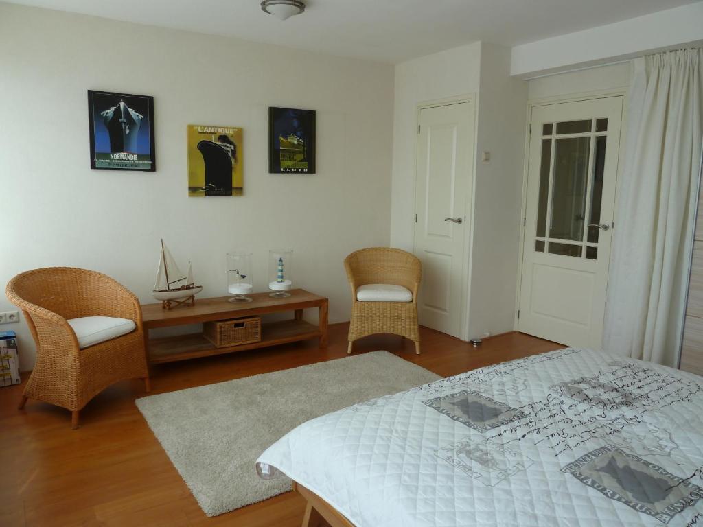 Ein Bett oder Betten in einem Zimmer der Unterkunft Appartement "Zicht op de Vuurtoren"