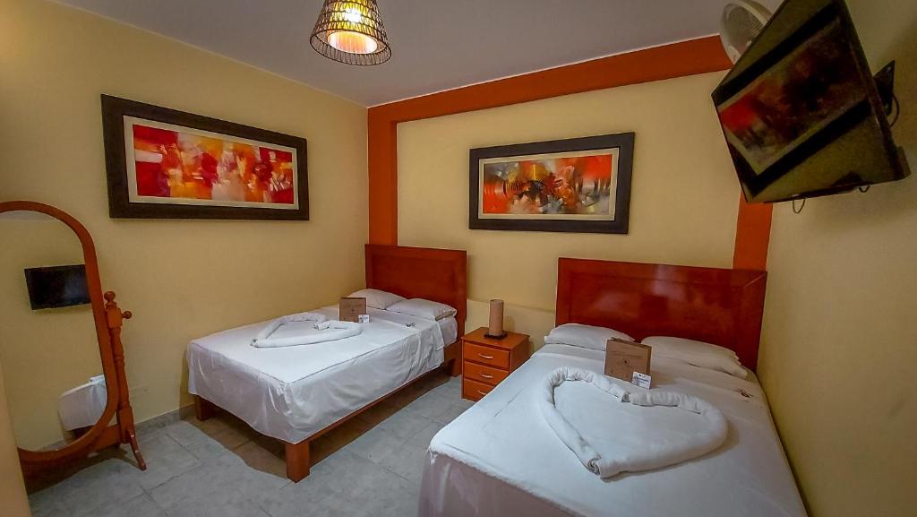 Postel nebo postele na pokoji v ubytování Resort la Fogata Cieneguilla