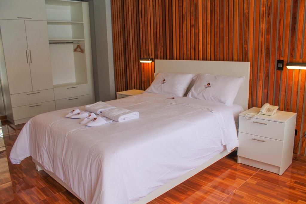 Postel nebo postele na pokoji v ubytování Resort la Fogata Cieneguilla