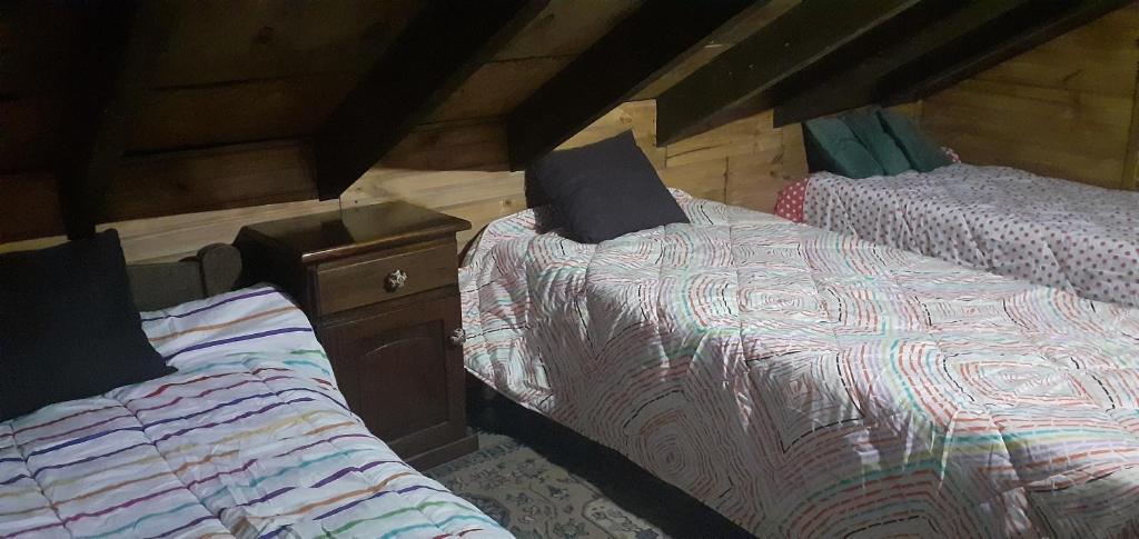 Postel nebo postele na pokoji v ubytování Bunker Hostel