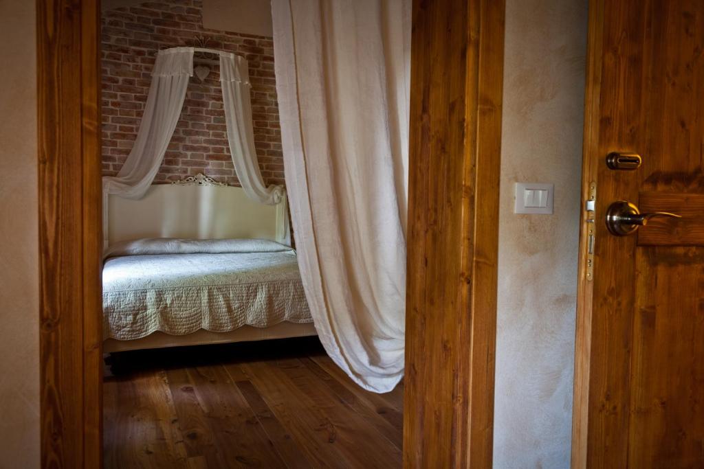 Postel nebo postele na pokoji v ubytování Ca' Muliner