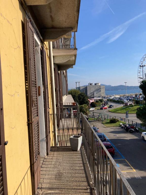 a balcony of a building with a view of a parking lot at Casa vacanza sole lago… in Intra