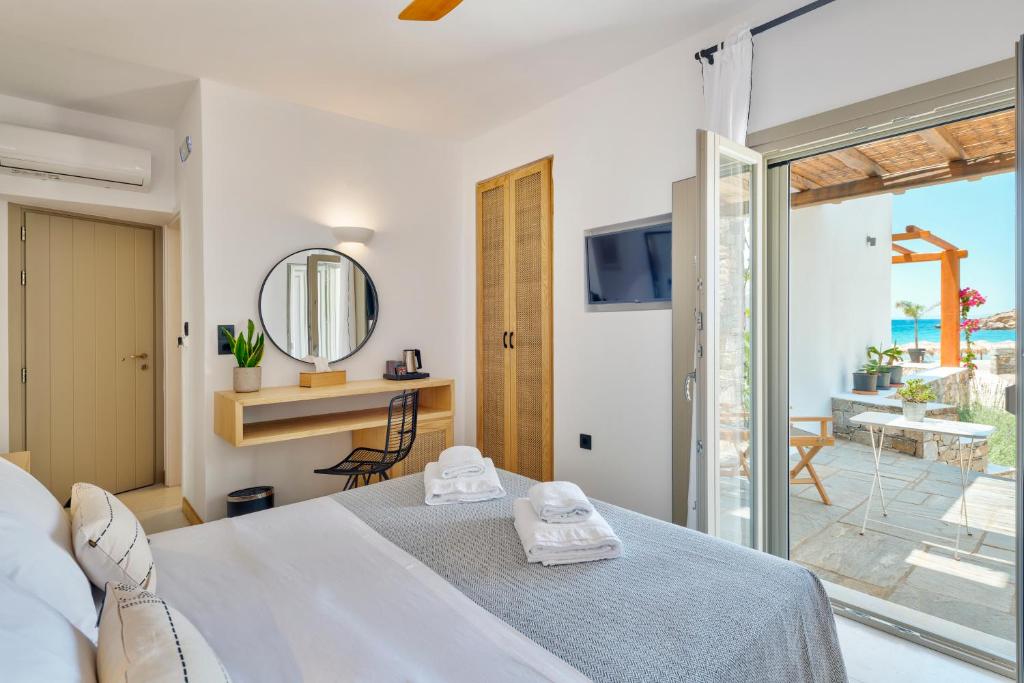 Кровать или кровати в номере Calma Boutique Hotel