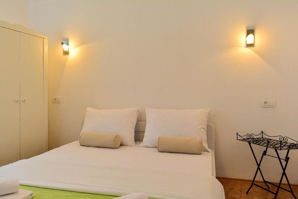 Postel nebo postele na pokoji v ubytování Golden B&B