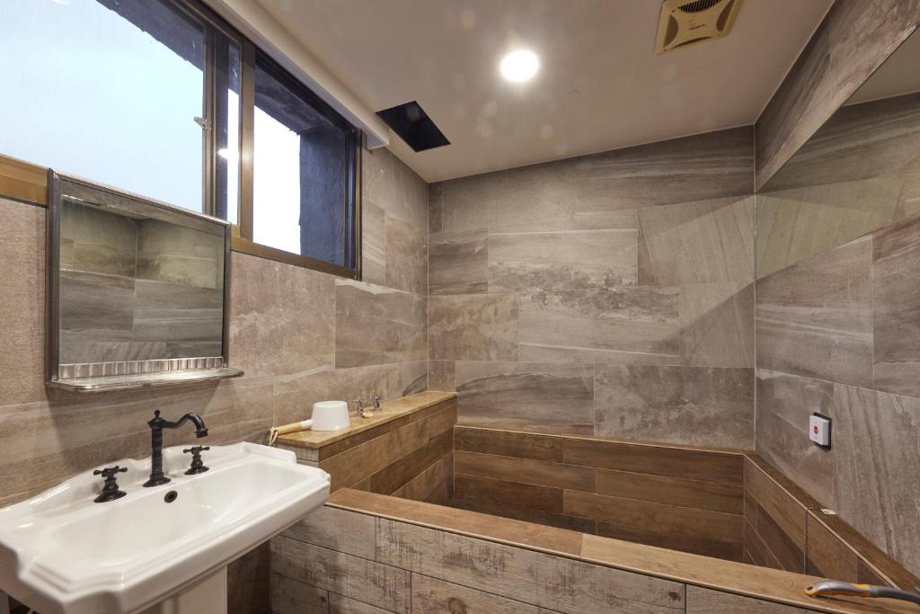 Koupelna v ubytování Kyokusui Hotspring Hotel