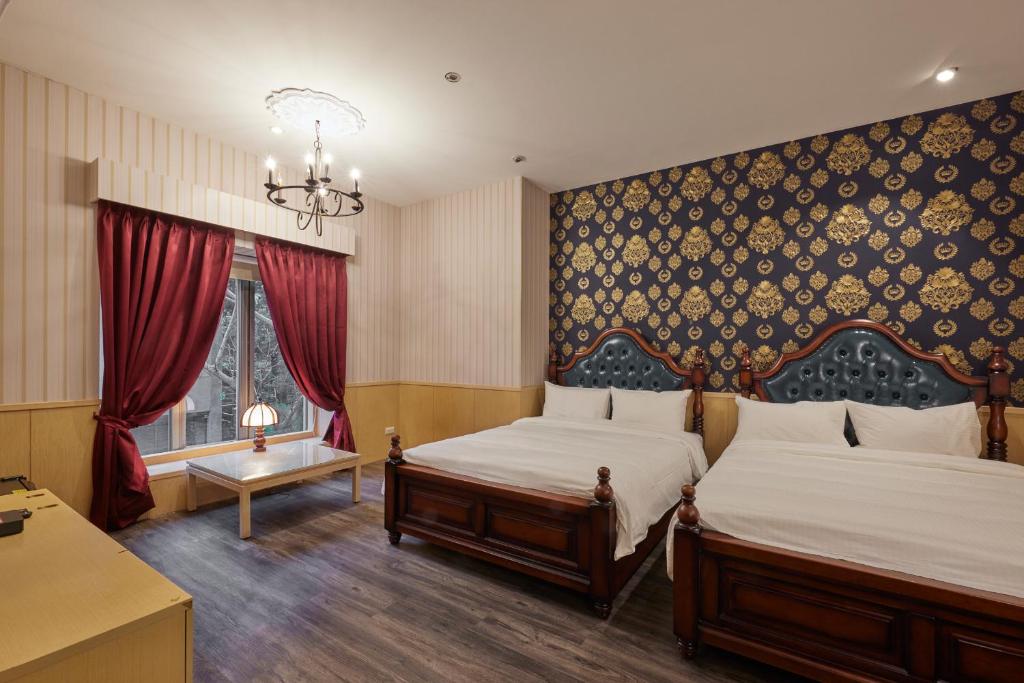 Postel nebo postele na pokoji v ubytování Kyokusui Hotspring Hotel