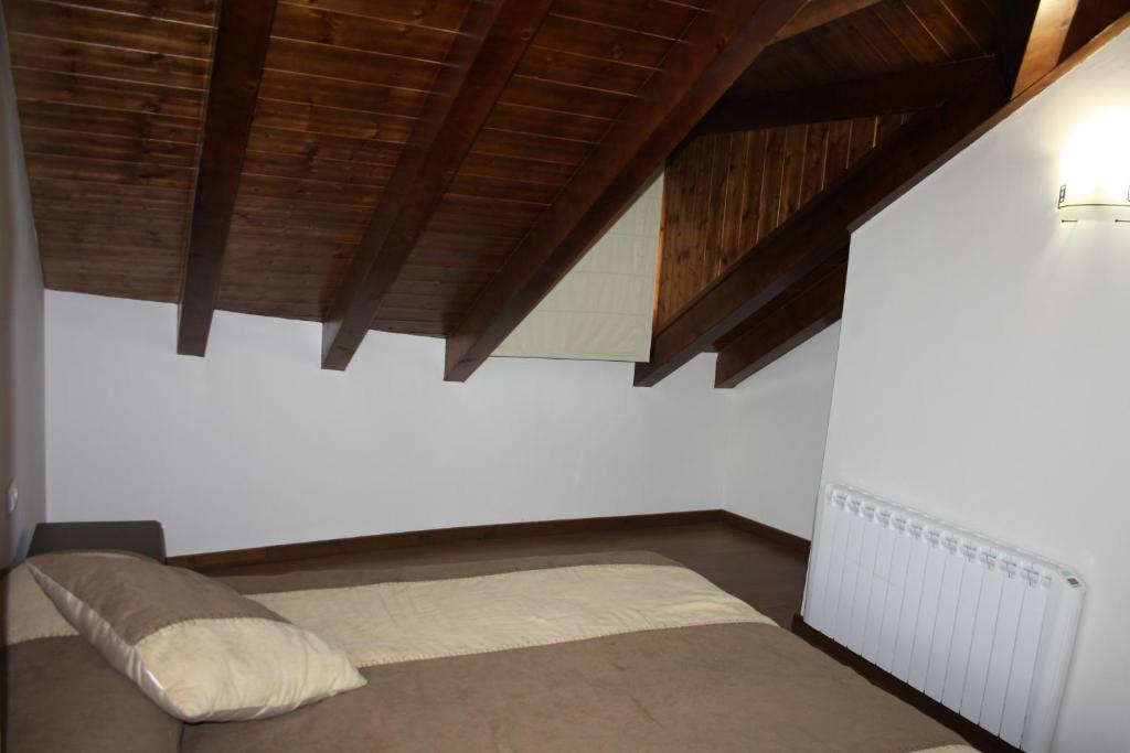 Postel nebo postele na pokoji v ubytování Nadal Apartaments