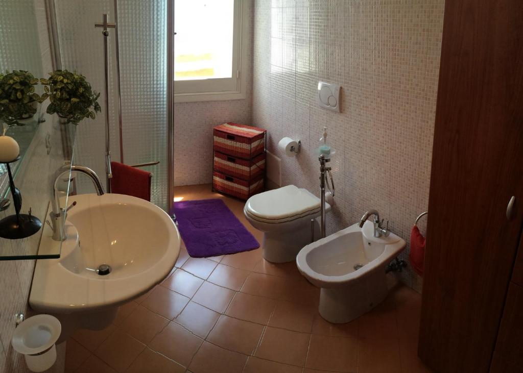 Koupelna v ubytování Casa dei Glicini