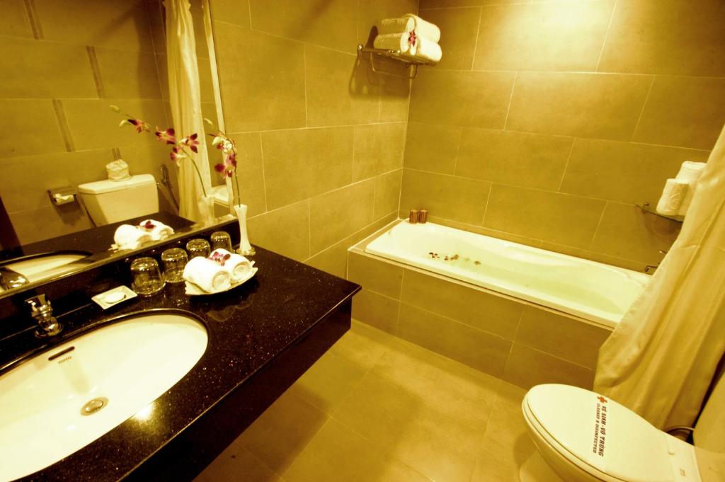 Koupelna v ubytování Asia Paradise Hotel