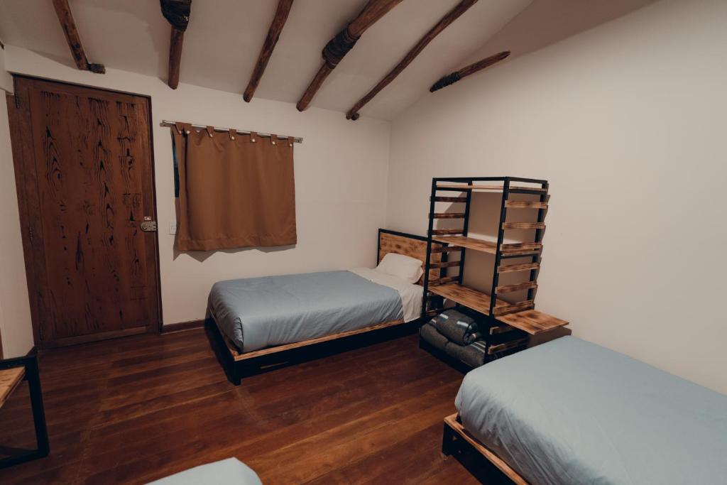 Postel nebo postele na pokoji v ubytování Hommam