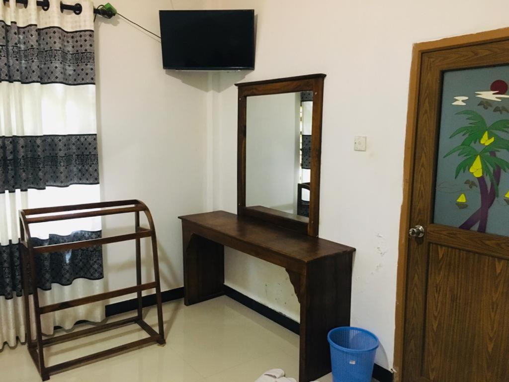 TV a/nebo společenská místnost v ubytování Restwell Homestay