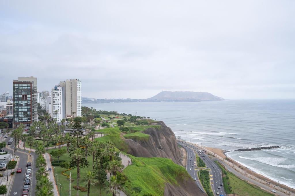 an aerial view of a beach and the ocean at Outstanding Ocean View 2BR 2BA Pool Gym by GLOBALSTAY in Lima
