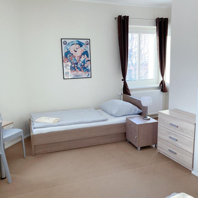 Postel nebo postele na pokoji v ubytování Hotel U námořníka