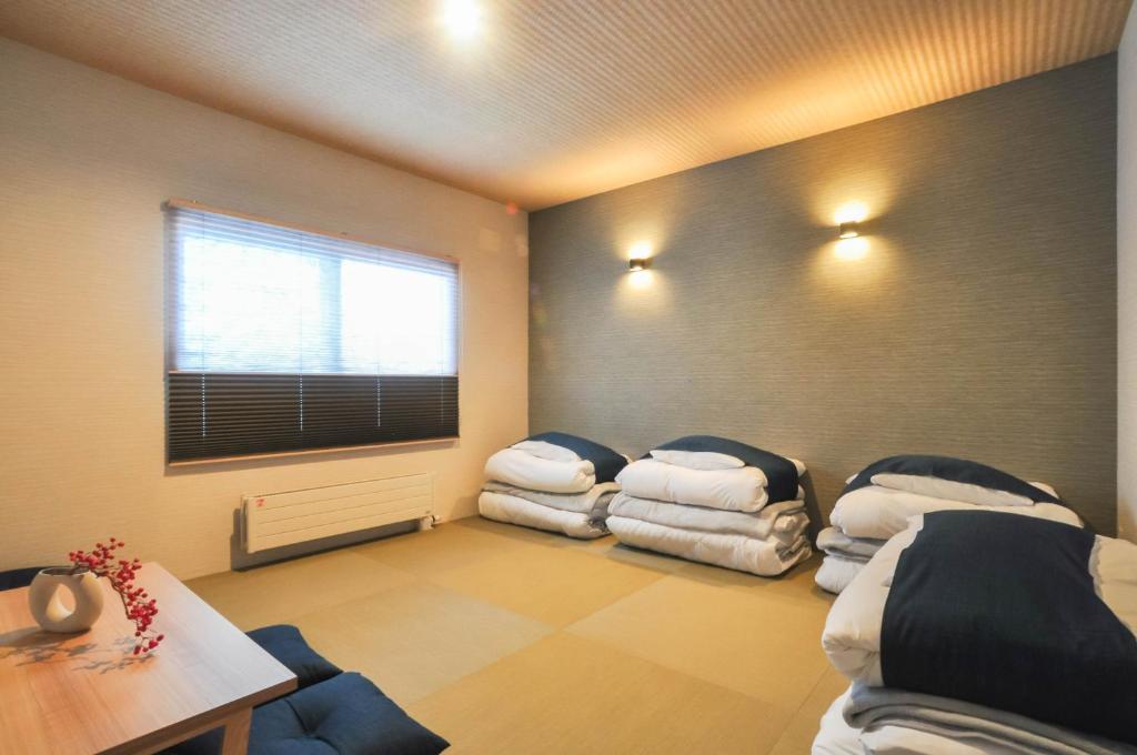 Rusutsu Grand Cabin - Habitación Cuádruple De Estilo Japonés
