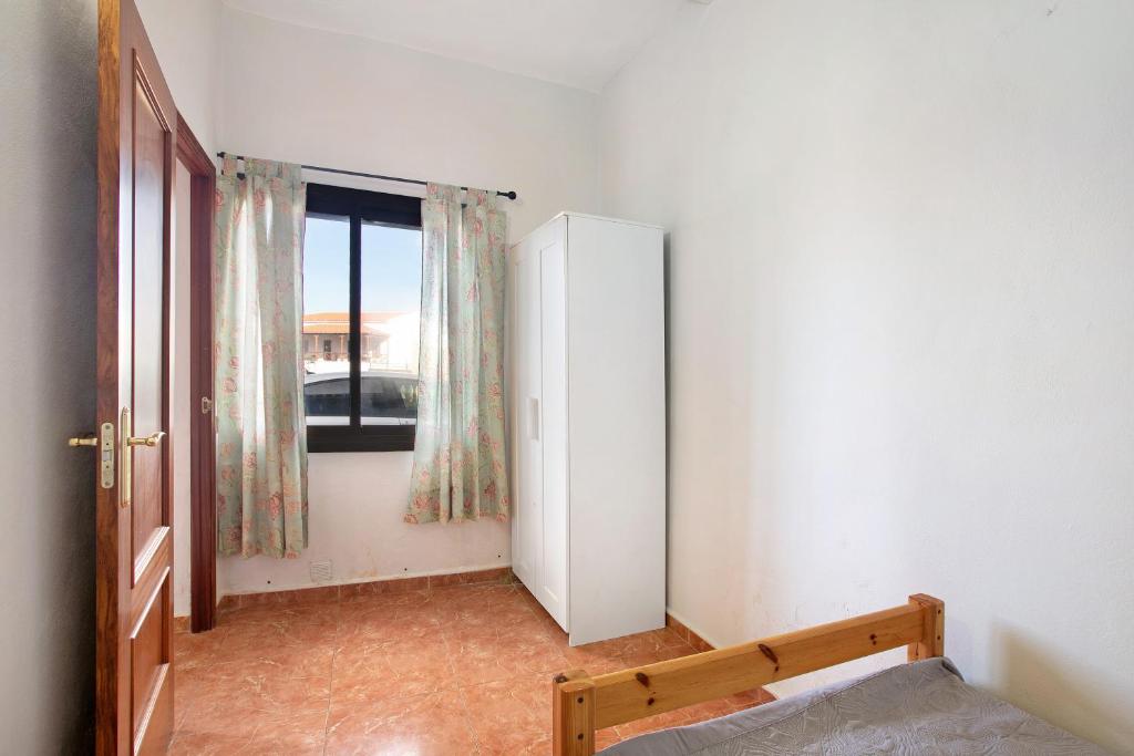 Postel nebo postele na pokoji v ubytování Casa Marrero Abajo