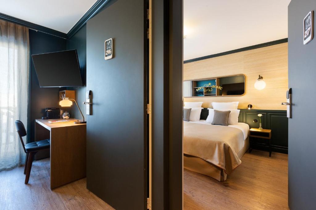 Postel nebo postele na pokoji v ubytování Ours Blanc Hotel & Spa
