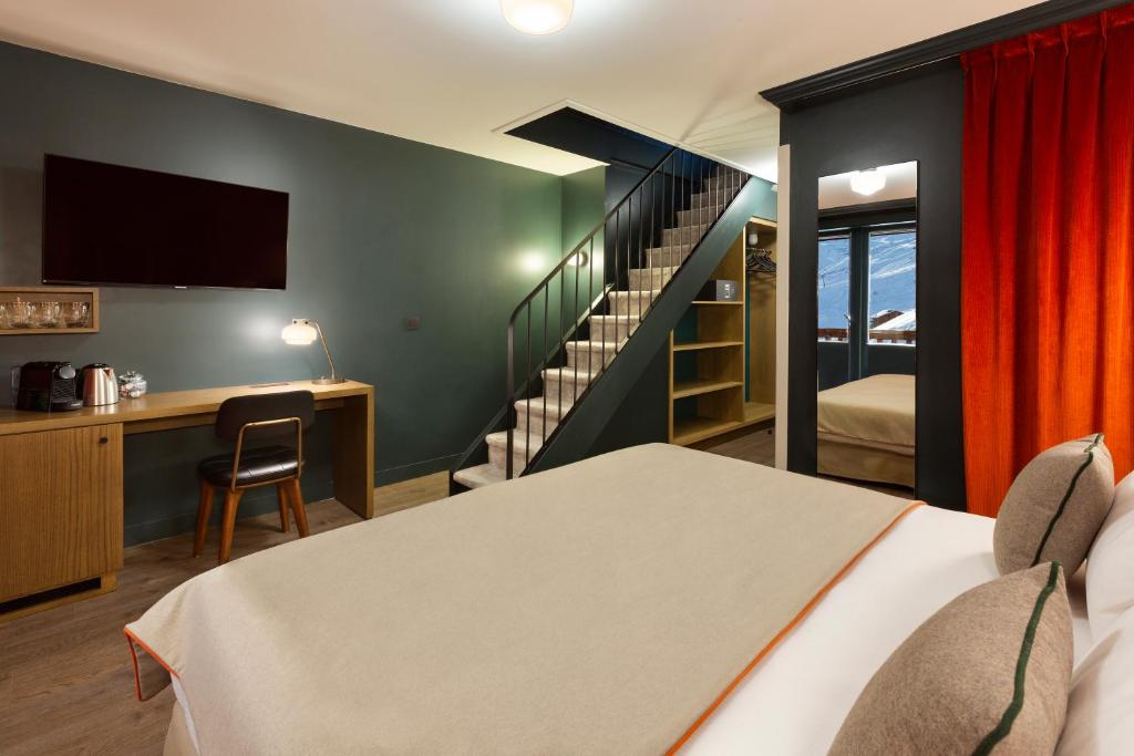 Postel nebo postele na pokoji v ubytování Ours Blanc Hotel & Spa