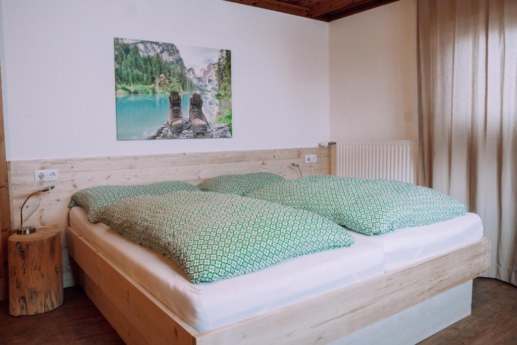 A bed or beds in a room at Haus Renswouw