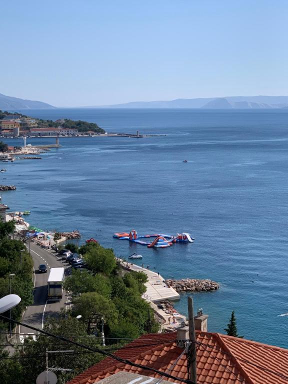 two boats in a large body of water at Apartment Ivanka in Senj