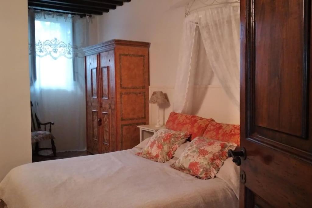 Postel nebo postele na pokoji v ubytování Villa Pianelli