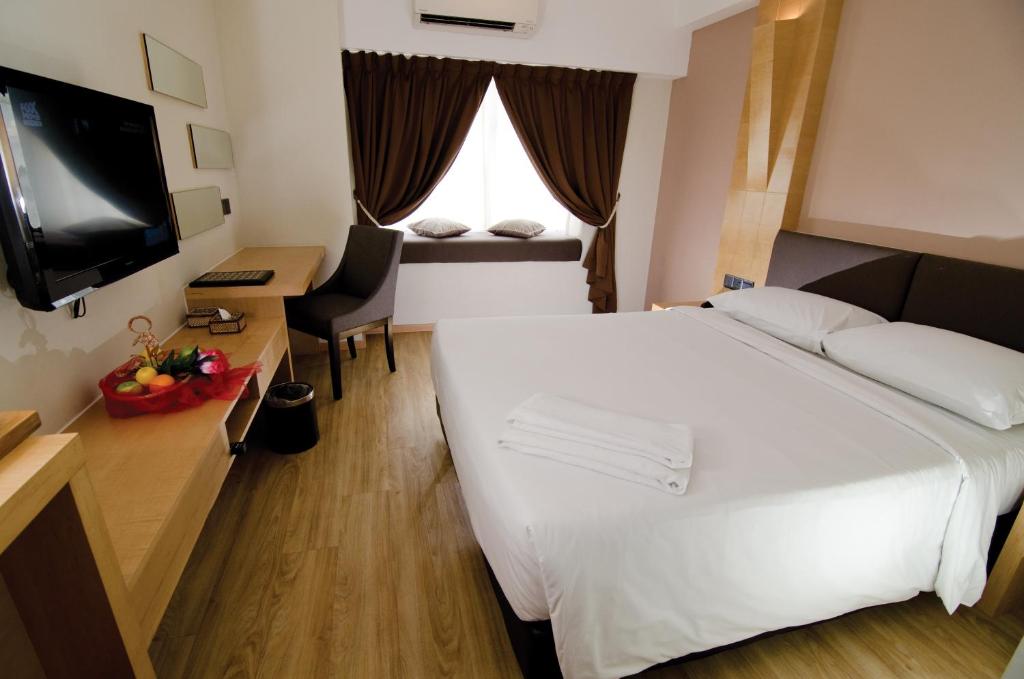 Letto o letti in una camera di C'haya Hotel