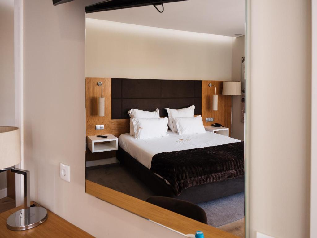 Postel nebo postele na pokoji v ubytování Hotel Fonte Velha