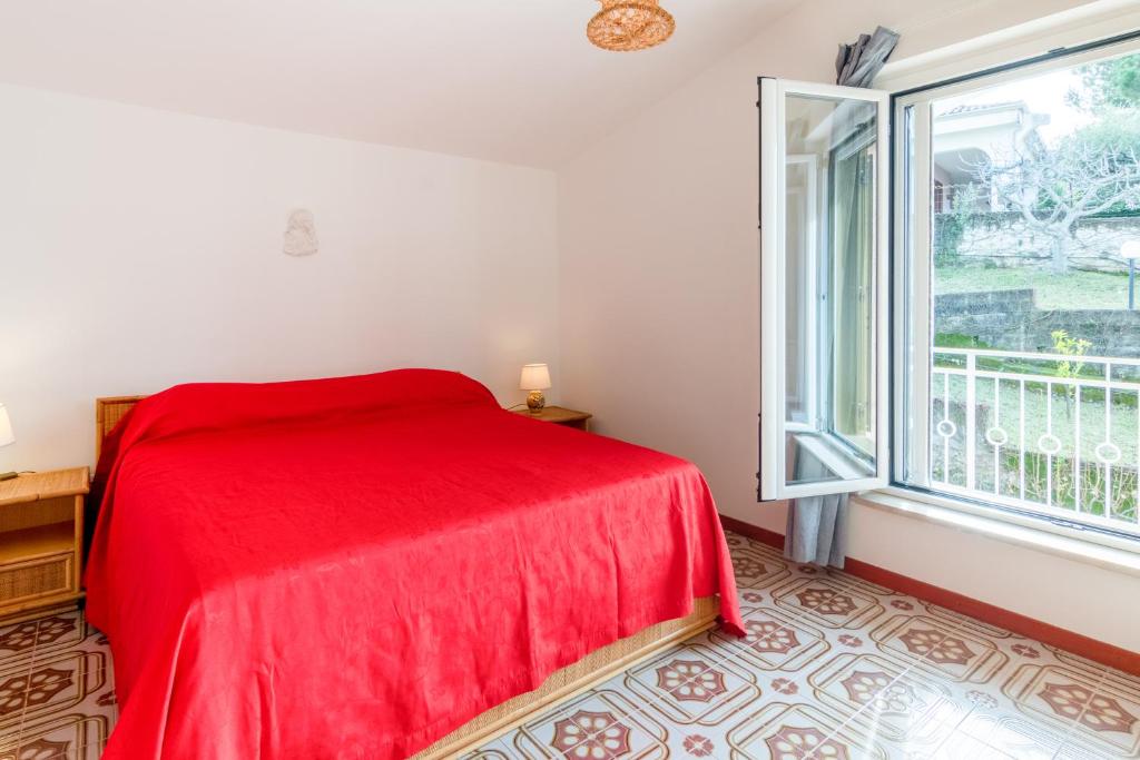 Posteľ alebo postele v izbe v ubytovaní Splendida Villa con vista sull'Isola di Cirella