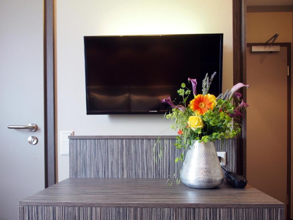 TV a/nebo společenská místnost v ubytování Myhotel