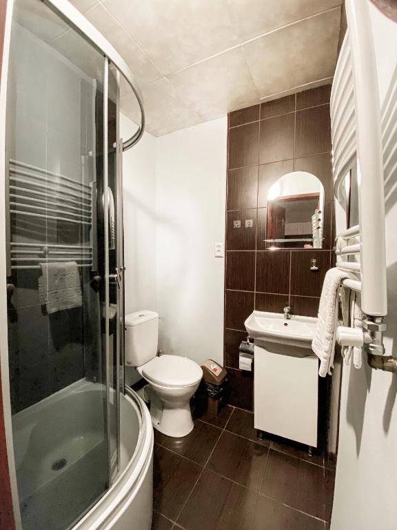 Koupelna v ubytování Guest House Lviv