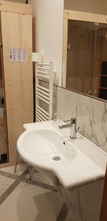 Koupelna v ubytování Hotel Moena