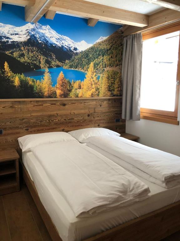 Postel nebo postele na pokoji v ubytování B&B el Benel