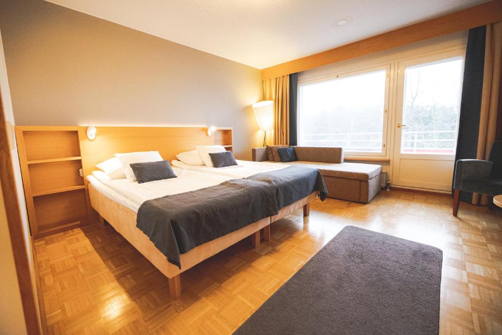 Postel nebo postele na pokoji v ubytování Spahotel Casino