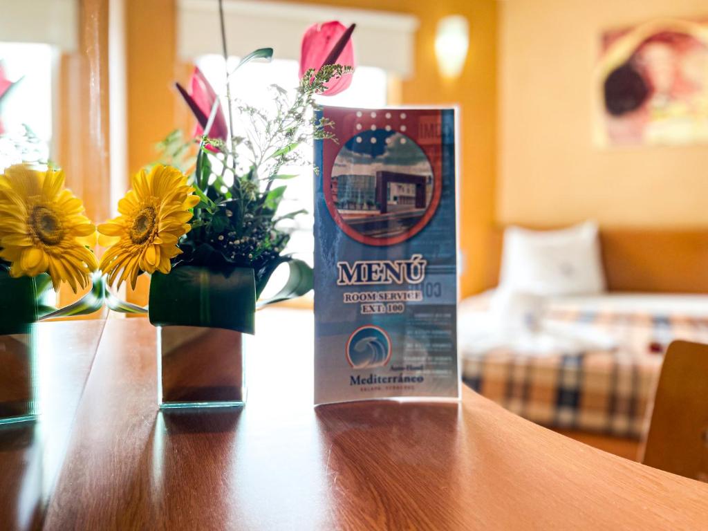 Postel nebo postele na pokoji v ubytování Auto Hotel Mediterráneo