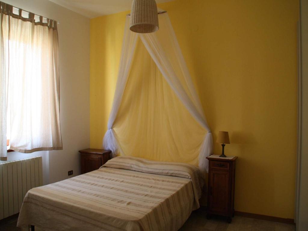 A bed or beds in a room at Cristina B&B
