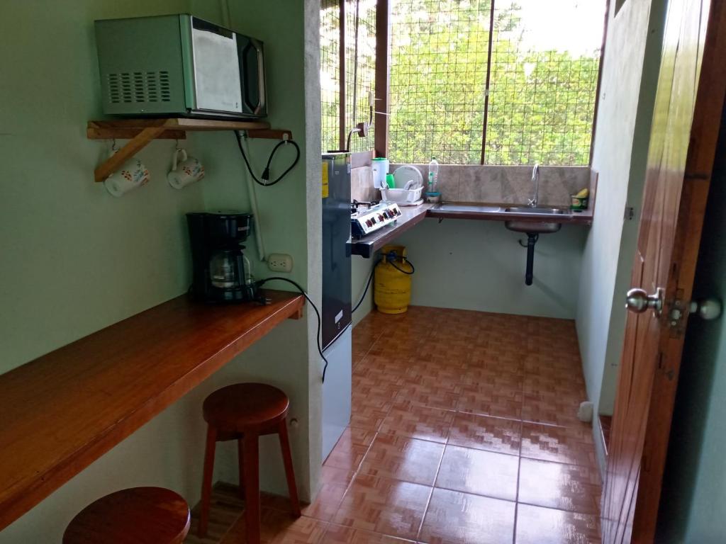 Kuchyň nebo kuchyňský kout v ubytování Posada Rural Río Celeste