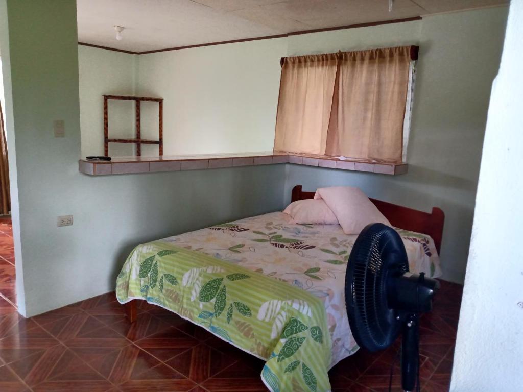 Postel nebo postele na pokoji v ubytování Posada Rural Río Celeste