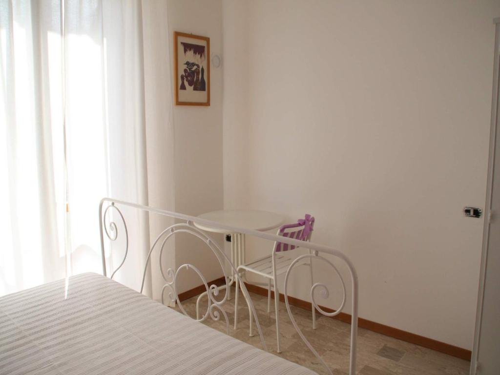 A bed or beds in a room at Cristina B&B
