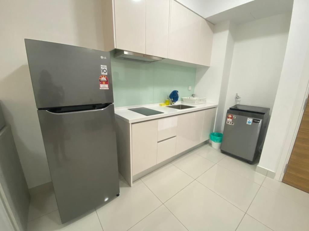 Kuchyň nebo kuchyňský kout v ubytování Teega Suites, Puteri Harbour, Iskandar Puteri