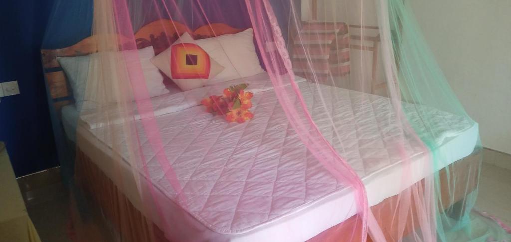 Postel nebo postele na pokoji v ubytování Mellow Homestay