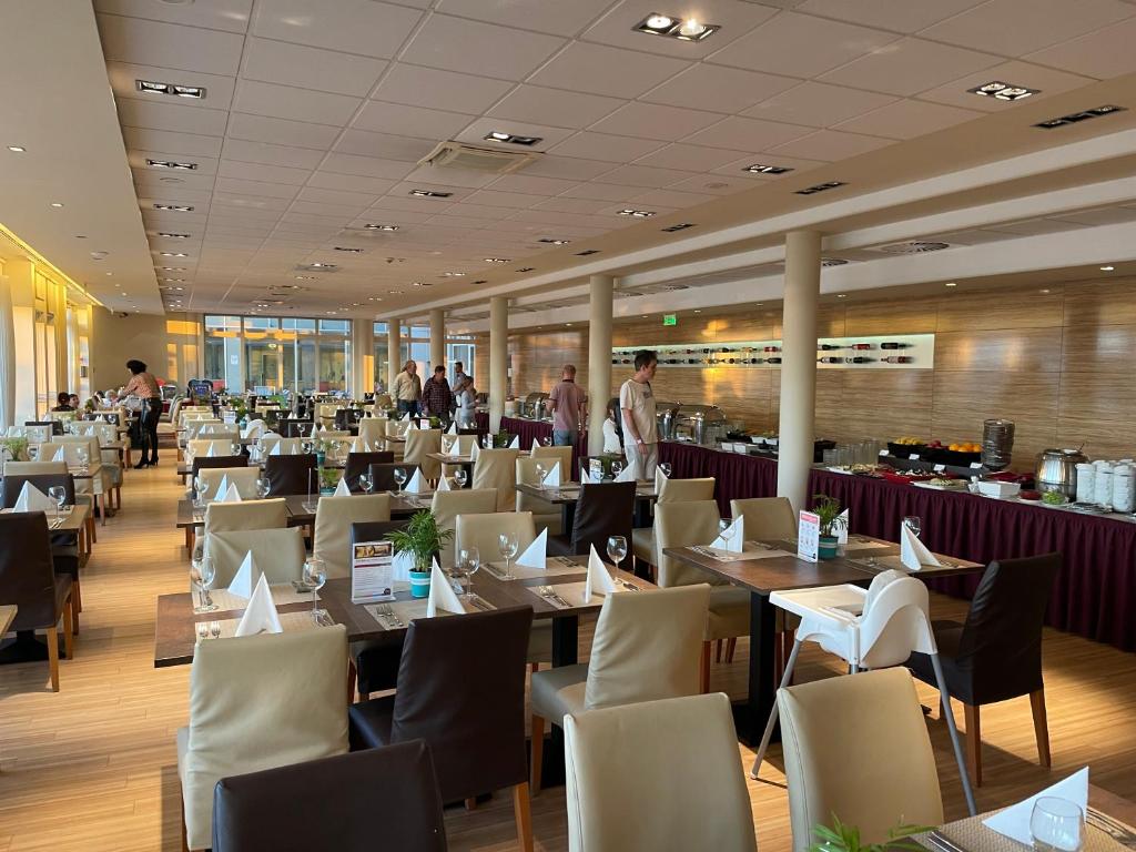 Restaurace v ubytování Velence Sunset Wellness Apartman