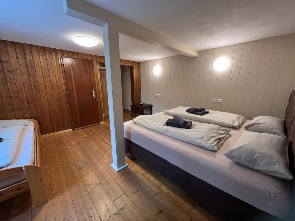 Posteľ alebo postele v izbe v ubytovaní Wood Lodge