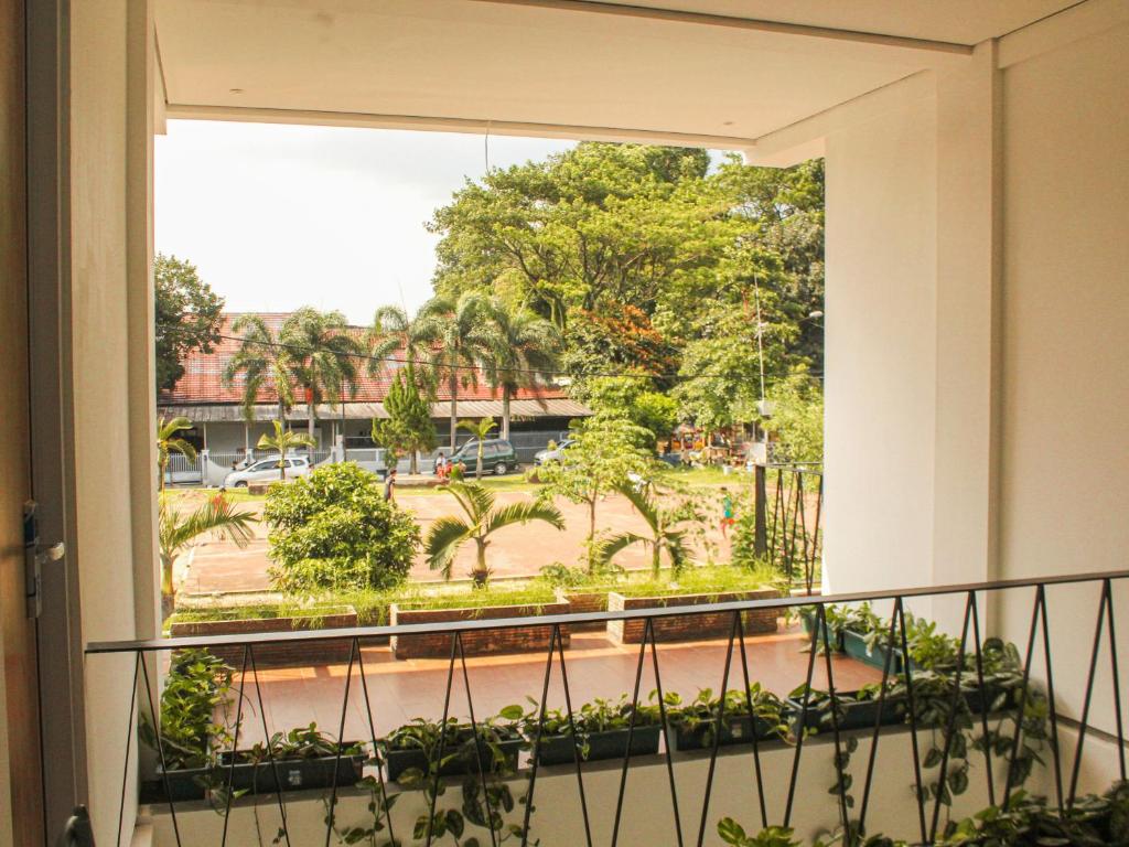 Balkón nebo terasa v ubytování Rion Hostel Bogor