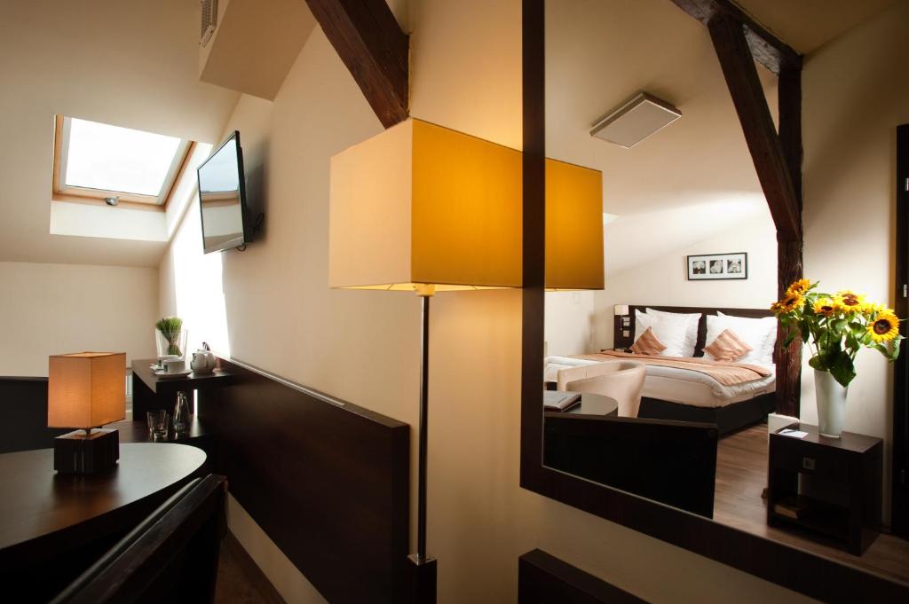 Postel nebo postele na pokoji v ubytování Spatz Aparthotel