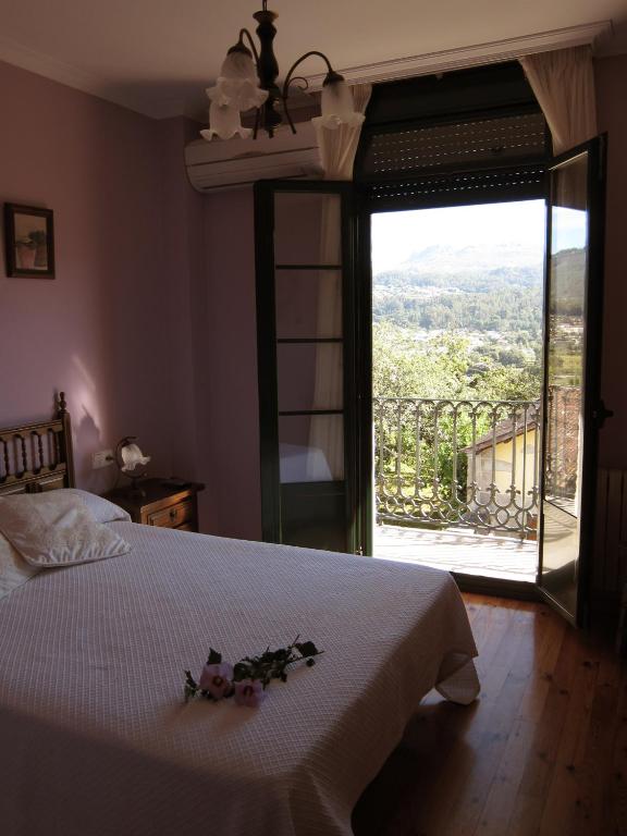 Postel nebo postele na pokoji v ubytování Casa Roque