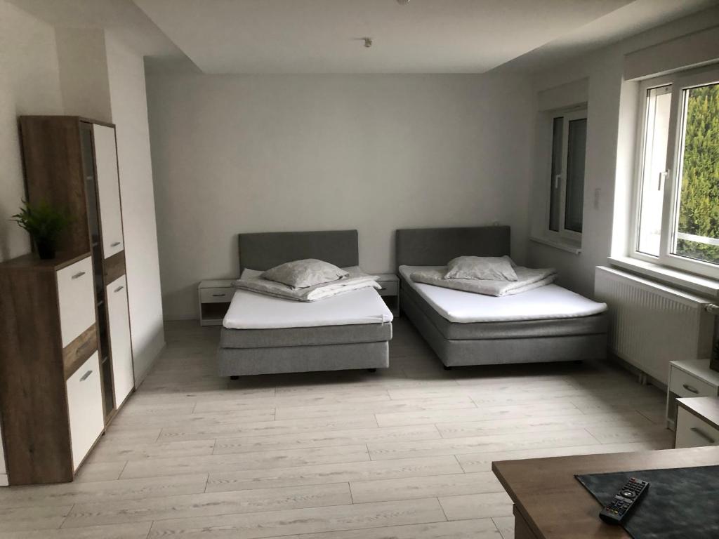 Postel nebo postele na pokoji v ubytování Appartement Willa chez willi