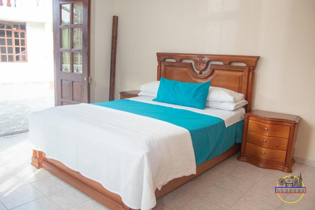 Postel nebo postele na pokoji v ubytování Hotel Finca Londres