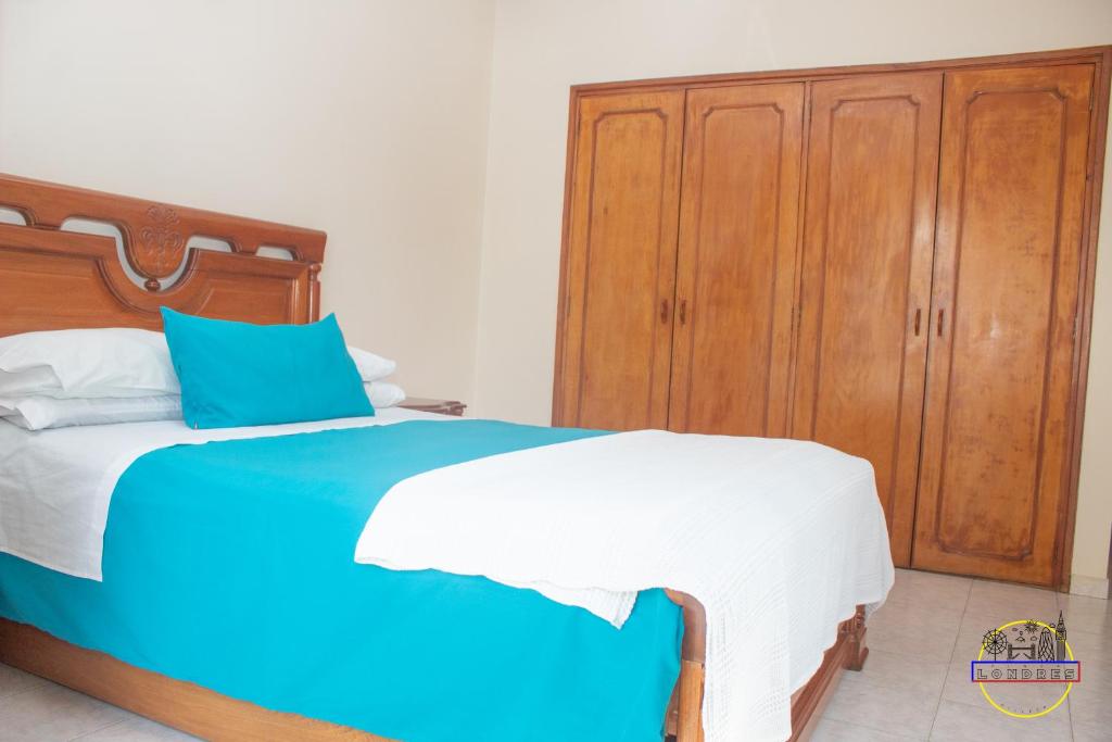 Postel nebo postele na pokoji v ubytování Hotel Finca Londres
