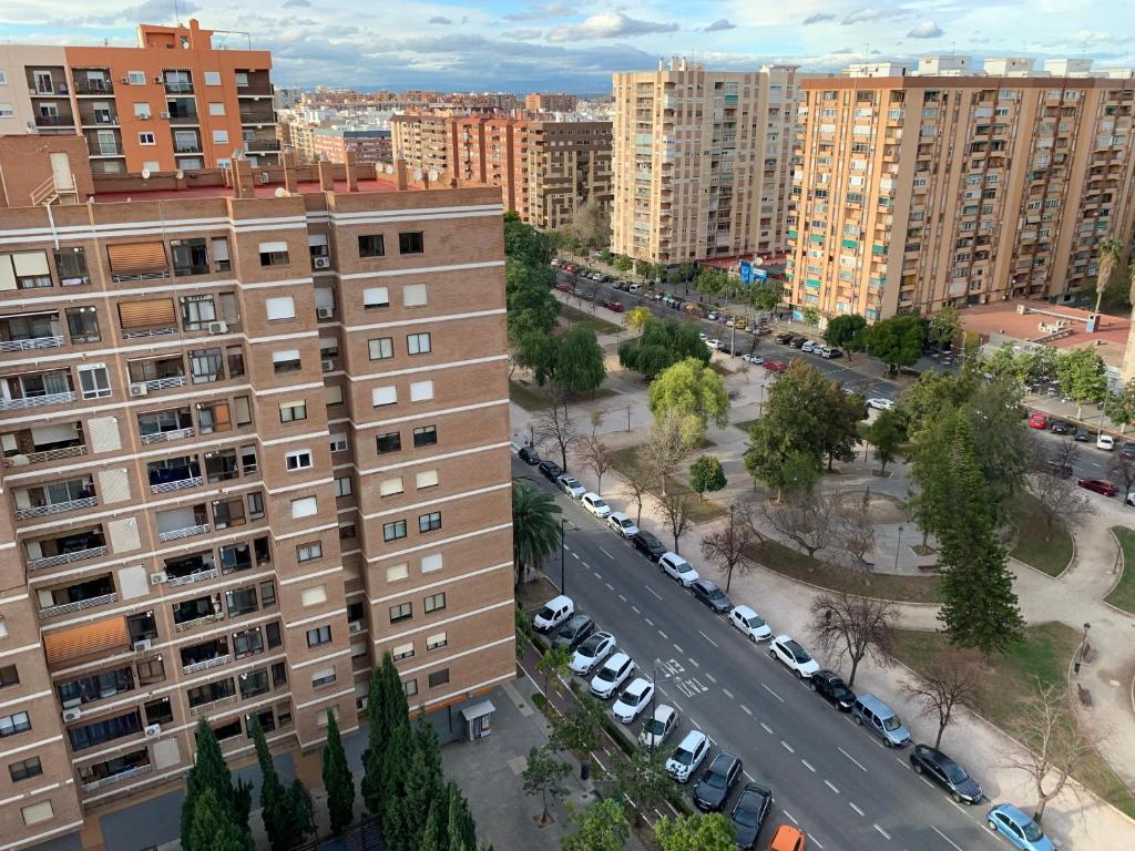 an aerial view of a city with tall buildings at Habitación con cama doble, piso compartido en Avenida Blasco Ibáñez in Valencia