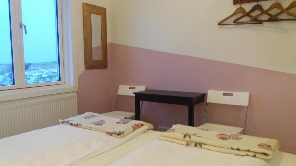 Postel nebo postele na pokoji v ubytování Gauksmýri guesthouse lodge